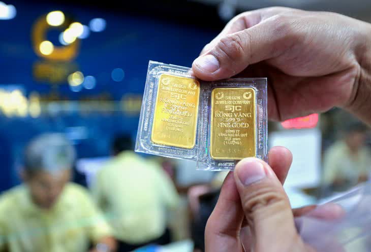 Đọc nhanh 27-7: Giá dầu lao dốc mạnh, giá vàng lại bật tăng - Ảnh 1.
