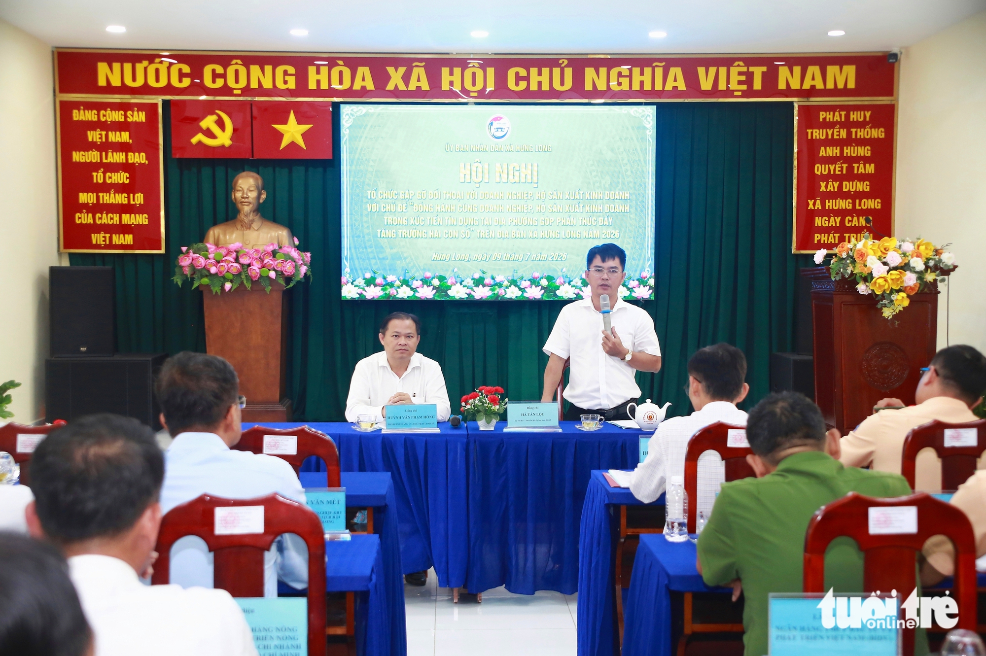 Xã Hưng Long đối thoại doanh nghiệp, hướng tới mục tiêu tăng trưởng hai con số - Ảnh 1.