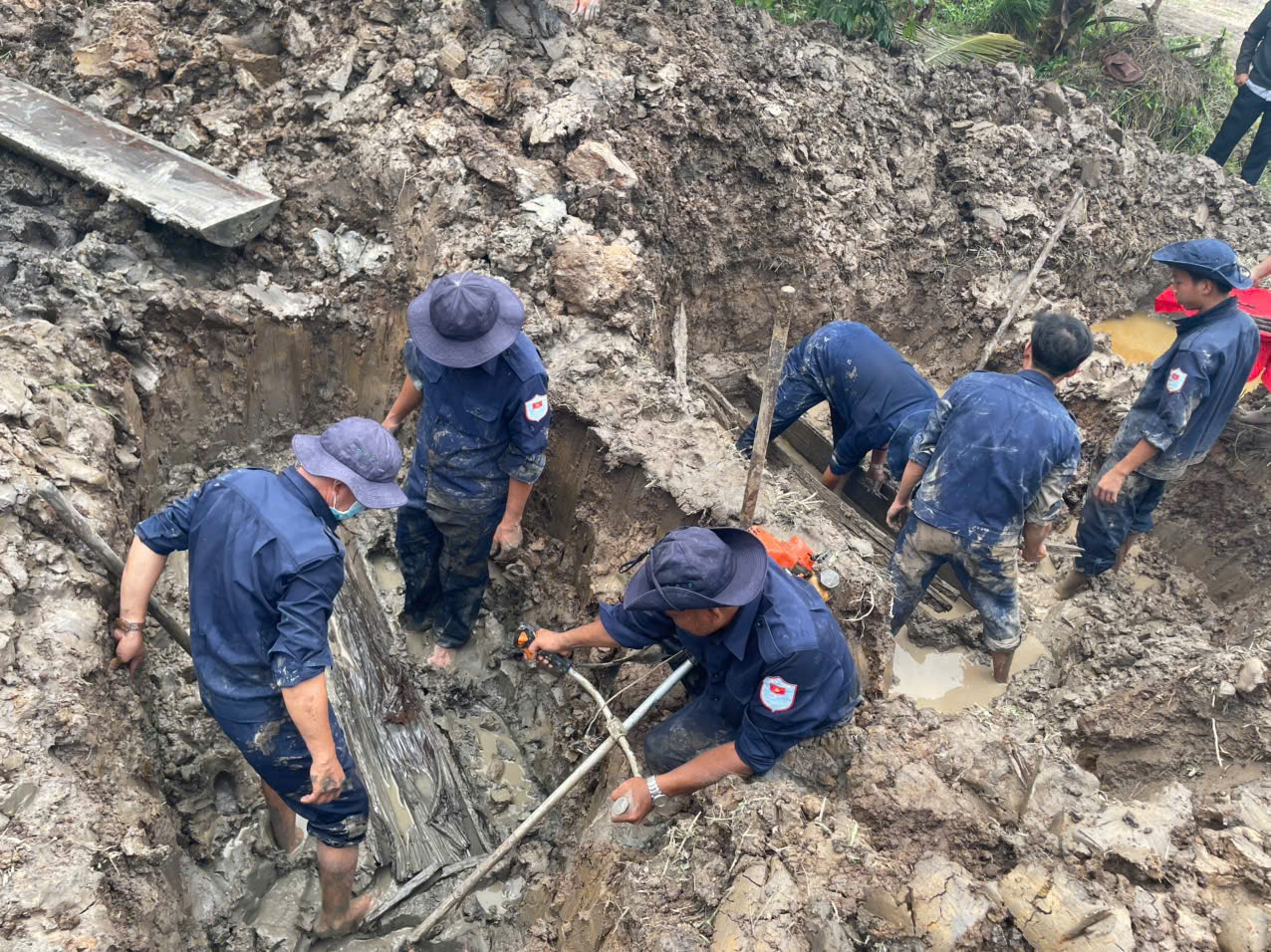 Qua thông tin cựu chiến binh, dân cung cấp, Đội K92 cất bốc được 3 hài cốt liệt sĩ ở xã Vĩnh Ty - Ảnh 1.