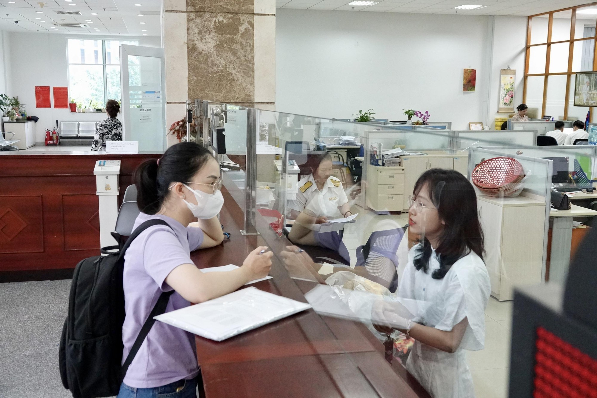 Nghiêm cấm công chức thuế gợi ý bồi dưỡng, móc nối ‘làm nhanh’, ‘xử lý ngầm’ với doanh nghiệp giải thể - Ảnh 1.