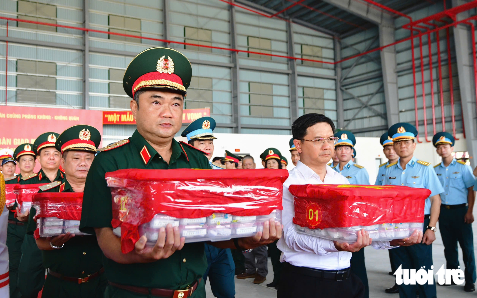 7.104 mẫu hài cốt liệt sĩ TP.HCM bắt đầu chuyến bay đi tìm danh tính  - Ảnh 2.