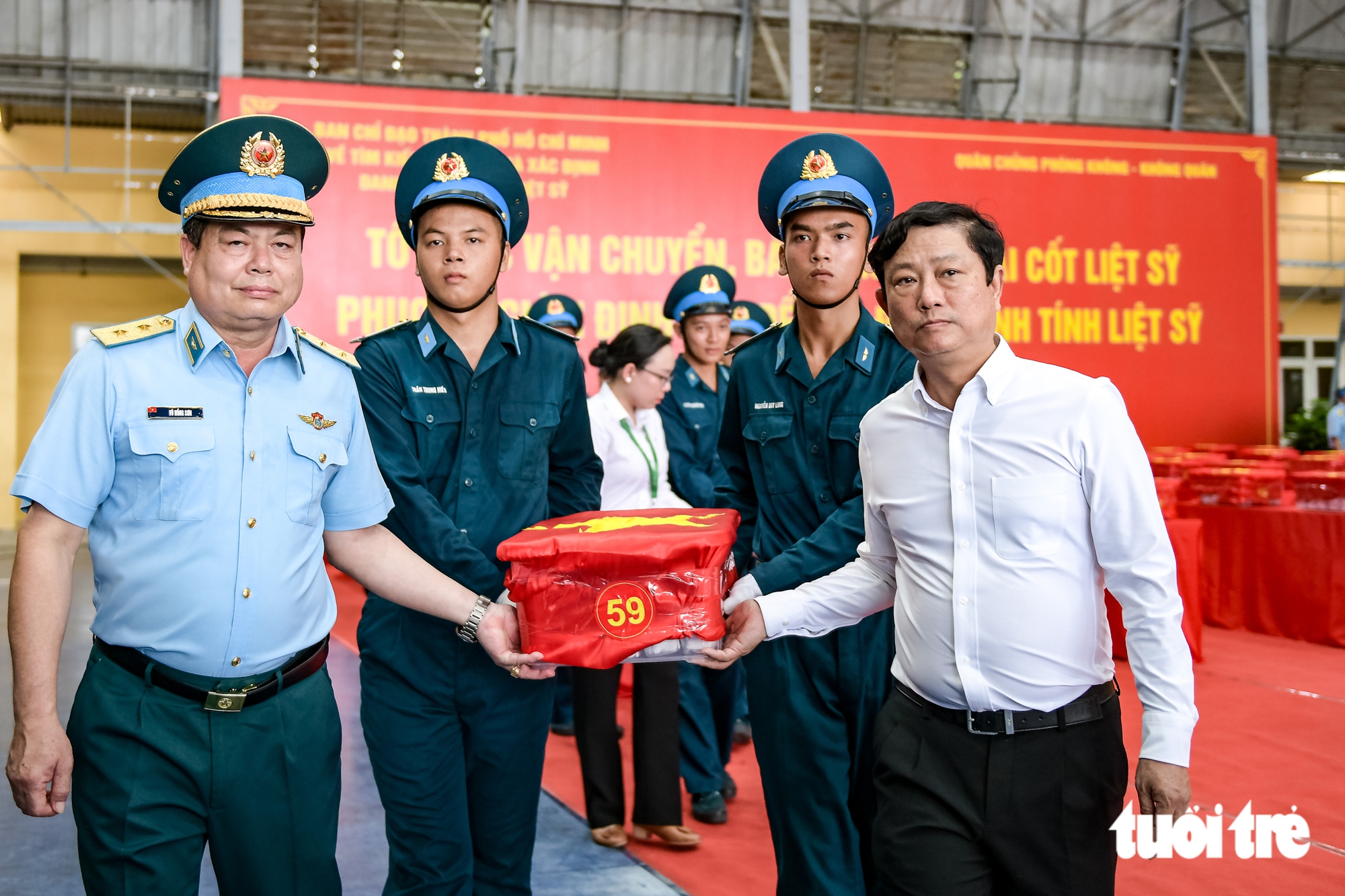 7.104 mẫu sinh phẩm hài cốt liệt sĩ từ TP Hồ Chí Minh đã tới Hà Nội - Ảnh 10.
