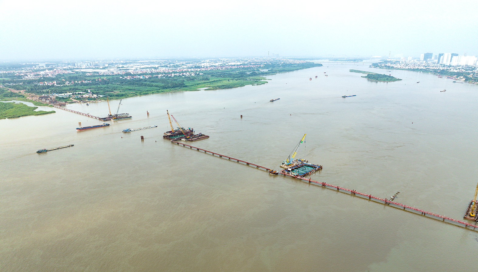 7 Cây cầu qua sông Hồng biến đổi không gian đô thị Hà Nội năm 2026 - Ảnh 8.