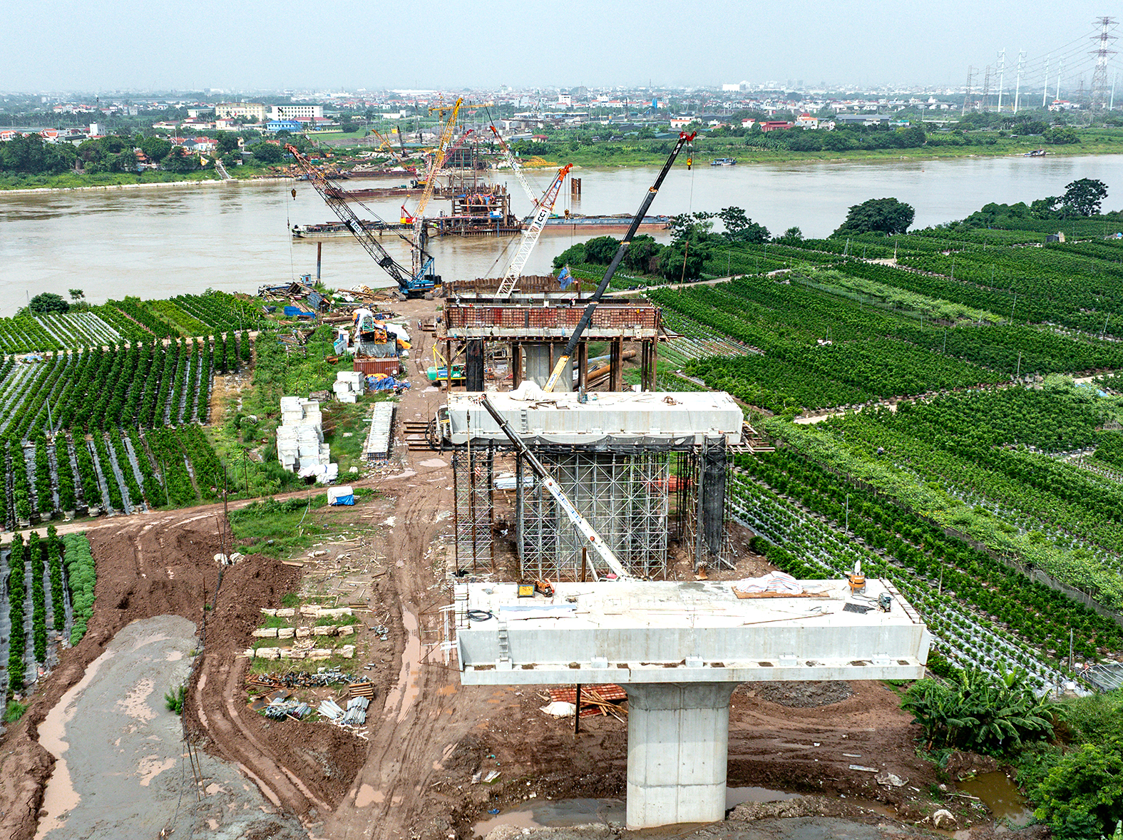 7 Cây cầu qua sông Hồng biến đổi không gian đô thị Hà Nội năm 2026 - Ảnh 20.