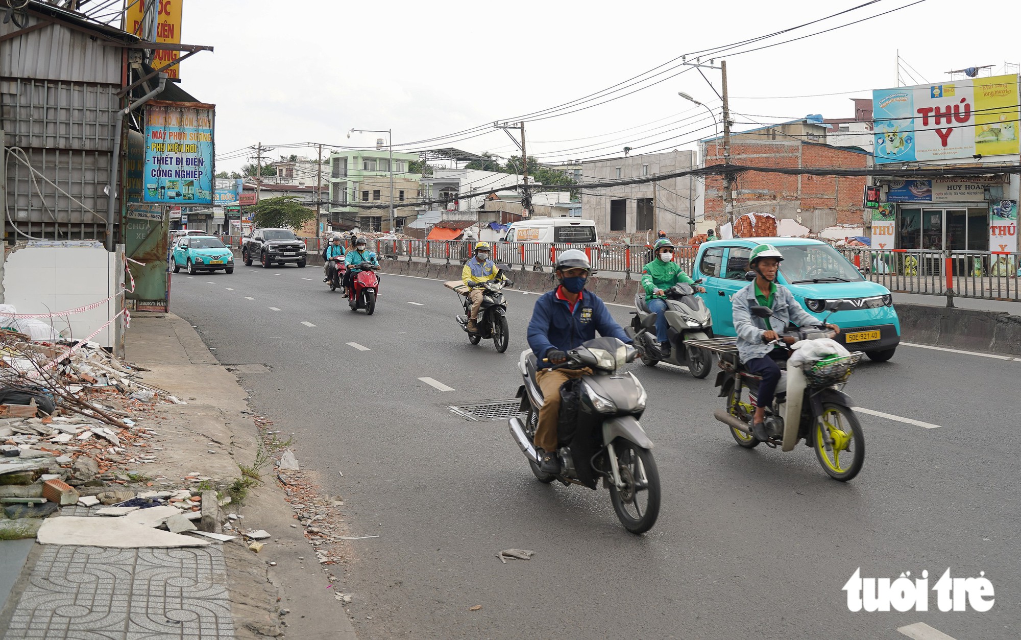 Người dân tất bật dọn nhà, nhường mặt bằng mở rộng Quốc lộ 13 trước ngày khởi công - Ảnh 13.
