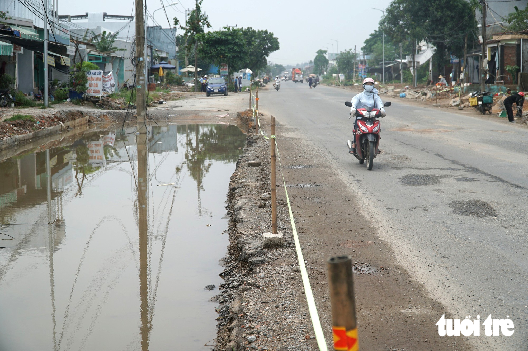 Quốc lộ 14B qua Đà Nẵng vẫn ngổn ngang, mịt mù dù sắp hết hạn bàn giao - Ảnh 10.