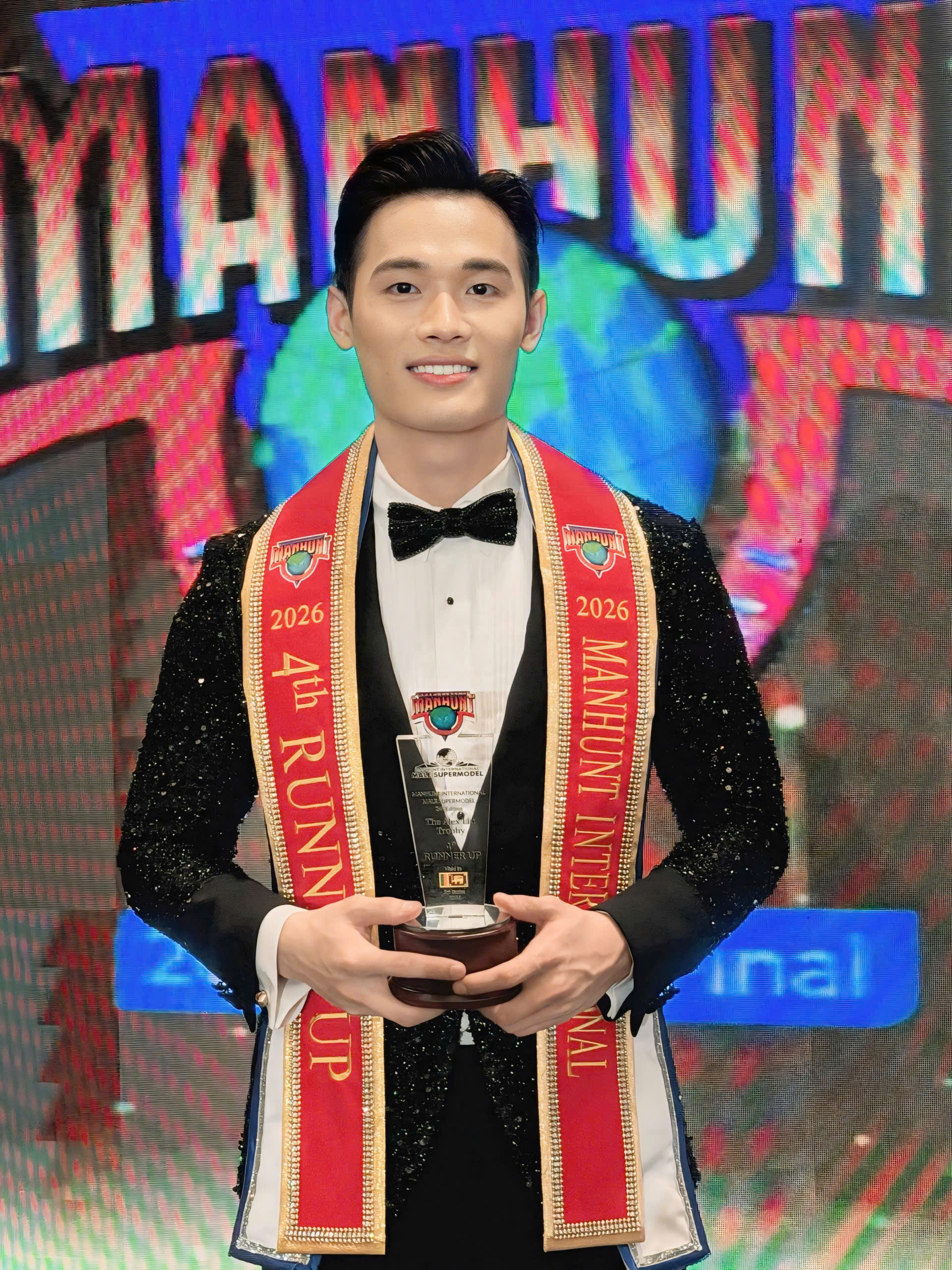 Trần Tiến Dũng đoạt á vương 4 Manhunt International, Việt Nam đăng cai 2027 - Ảnh 2.