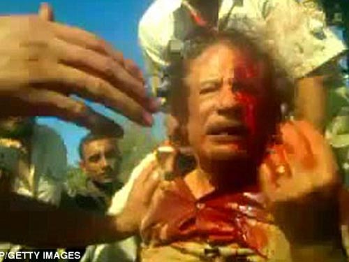Bán đấu giá nhẫn cưới, áo dính máu của ông Gaddafi