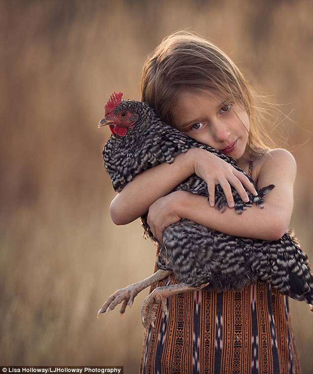 Tender: There are days where I feel like I need a quiet vacation, but honestly, I wouldnt change anything for the world, Ms Holloway says. Pictured, Camille