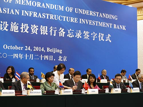 Lễ ký bản ghi nhớ về việc thành lập Ngân hàng đầu tư hạ tầng châu Á (AIIB) tại Bắc Kinh - Trung Quốc vào cuối tháng rồi Ảnh: Reuters