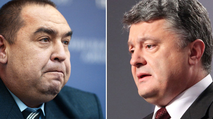Thủ lĩnh Cộng h&ograve;a Nh&acirc;n d&acirc;n Luhansk tự xưng (LPR) Igor Plotnitsky (tr&aacute;i) v&agrave; Tổng thống Ukraine Petro Poroshenko. Ảnh: RIA Novosti