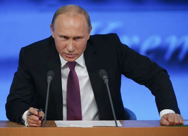 &Ocirc;ng Putin trả lời họp b&aacute;o h&ocirc;m 18-12. Ảnh: Reuters