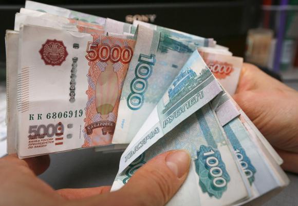 Đồng rúp tăng giá sau 3 tuần lao dốc. Ảnh: Reuters