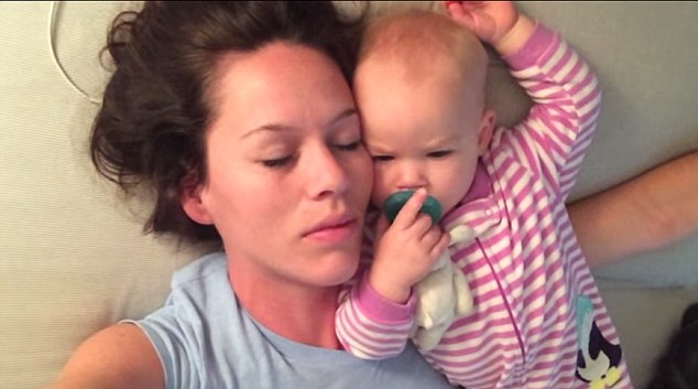 Peaceful: At first glance it may look like Esther Anderson and her baby are sleeping peacefully