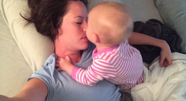 Kiss mommy awake: At one point baby tries a little bit of TLC to rouse mommy from her nap