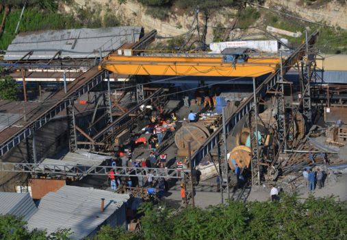 Rescue workers at the entrance of the mine after an explosion and fire at a coal mine in Soma, in western Turkey, Tuesday, May 13, 2014. An explosion and fire at a coal mine in western Turkey killed at least one miner Tuesday and left up to 300 workers trapped underground, a Turkish official said. Twenty people were rescued from the mine in the town of Soma in Manisa province but one later died in the hospital, Soma administrator Mehmet Bahattin Atci told reporters. The town is 250 kilometers (155 miles) south of Istanbul. TURKEY OUT Photo: IHA, AP / IHA
