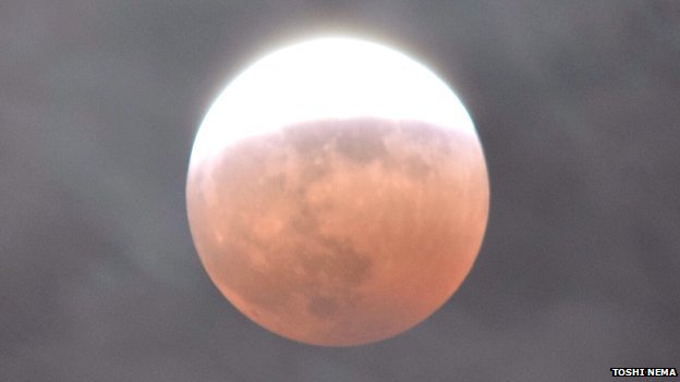 Eclipse from Tokyo by Toshi Nema