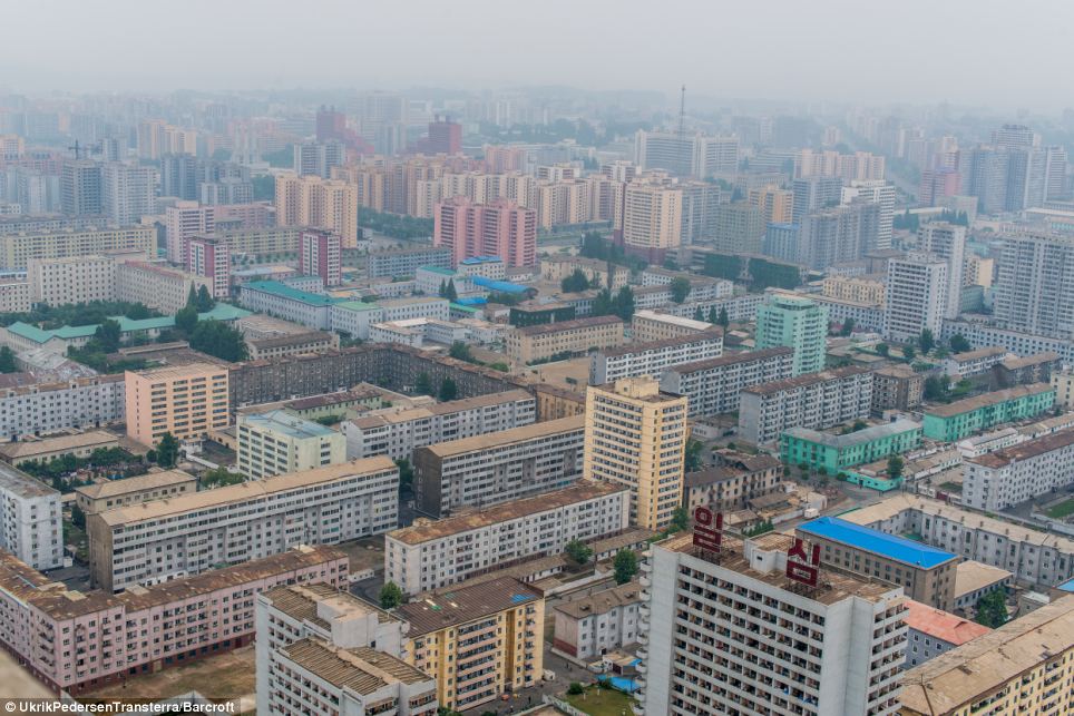 Mist hangs low over blocks of apartment buildings in this shot Pedersen took in the North Korean capital of Pyongyang while being given a guided tour of the country
