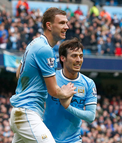 Man City dễ dàng đè bẹp Southampton 4-1 để thu ngắn cách biệt với Liverpool Ảnh: Reuters