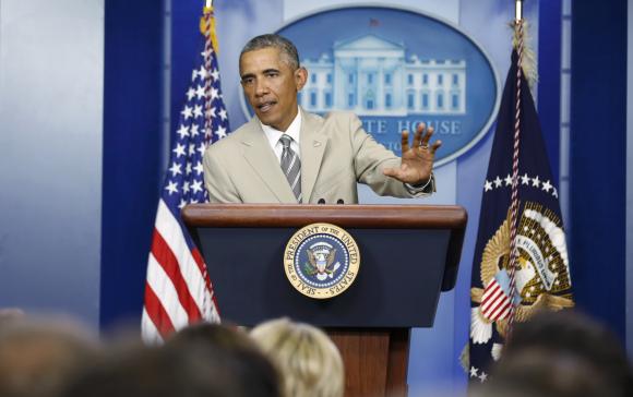 Tổng thống Obama ph&aacute;t biểu tại Nh&agrave; Trắng h&ocirc;m 28-8. Ảnh: Reuters