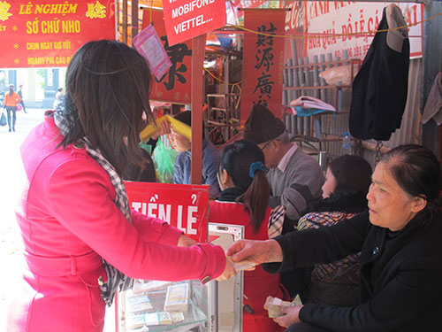 Tiền lì xì: Trong hiếm, ngoài... bao la