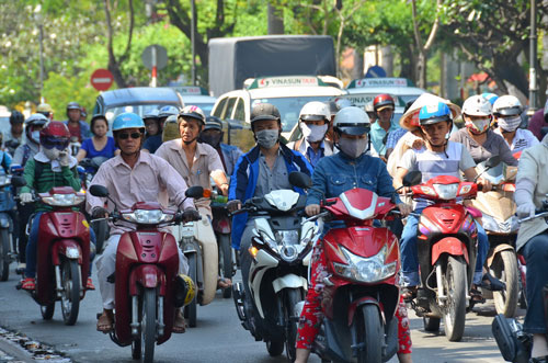 TP HCM băn khoăn về thu phí xe máy