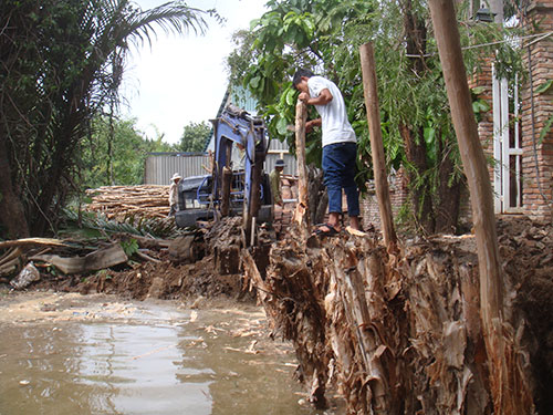 Th&aacute;ng 6-2014, gia đ&igrave;nh b&agrave; Nụ m&uacute;c đất trả lại hiện trạng rạch