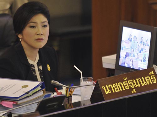 L&uacute;c n&agrave;y, nụ cười đ&atilde; hiếm khi nở tr&ecirc;n gương mặt Thủ tướng Yingluck Shinawatra. Ảnh: AP