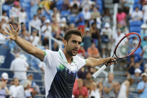 Marin Cilic giành vé vào tứ kết với chiến thắng trước Tsonga