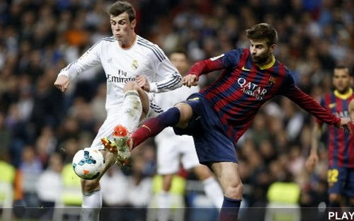 Pique tranh chấp b&oacute;ng với Gareth Bale