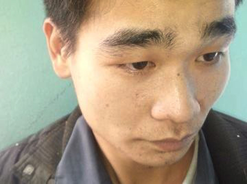 L&yacute; Văn H&agrave;nh sau khi bị bắt tại cơ quan c&ocirc;ng an