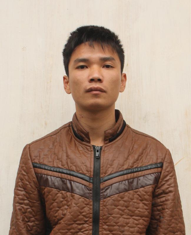 Đối tượng Ho&agrave;ng Tiến Dũng tại cơ quan c&ocirc;ng an.