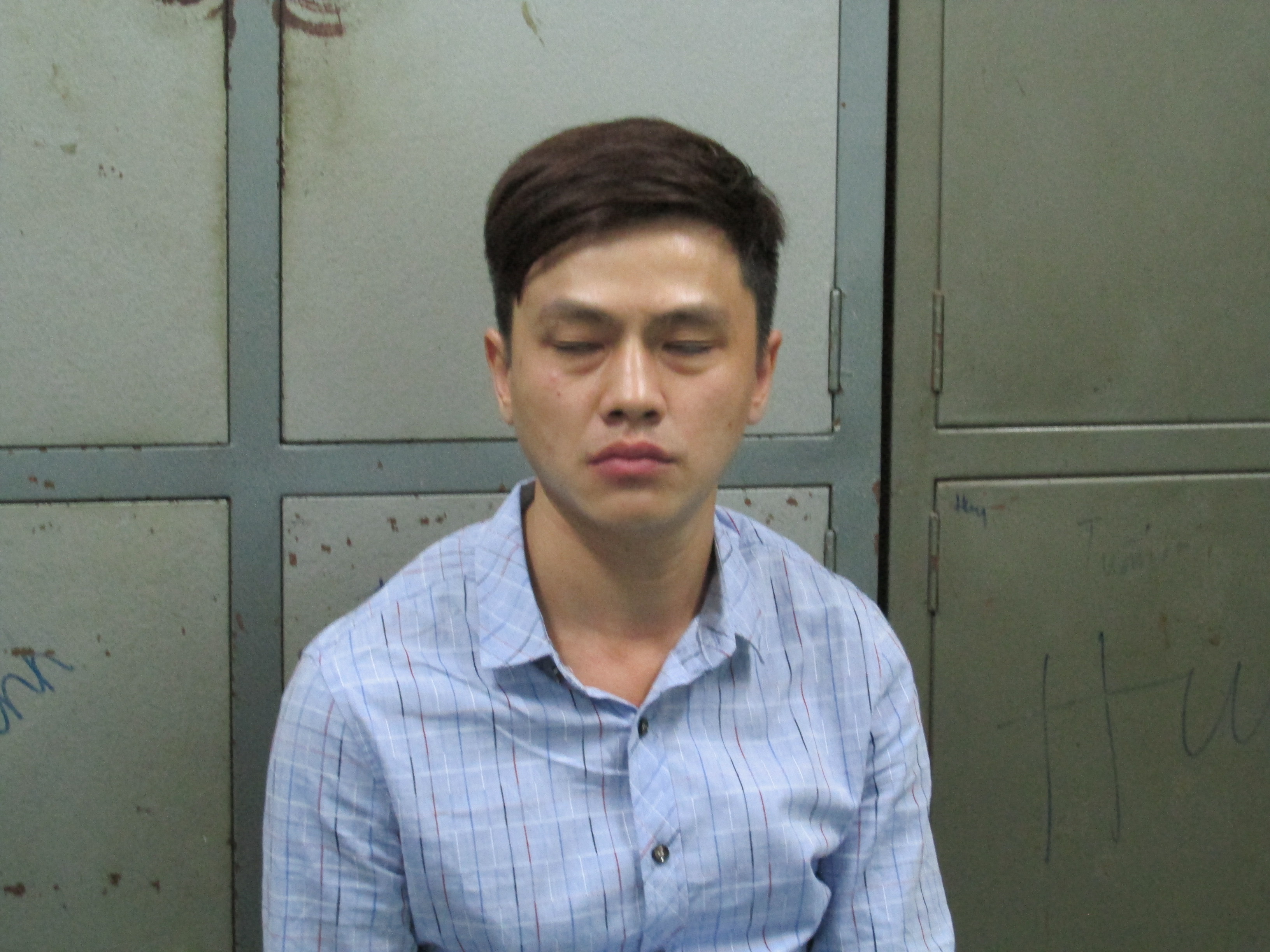 Shih Pao Yu (t&ecirc;n Việt Nam Bảo) tại c&ocirc;ng an.
