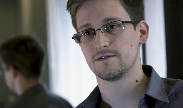 FILE - In this Sunday, June 9, 2013 file photo provided by The Guardian newspaper in London, shows Edward Snowden, who worked as a contract employee at the U.S. National Security Agency, in Hong Kong. Two Norwegian lawmakers said Wednesday, Jan. 29, 2014 that they have jointly nominated former NSA contractor Edward Snowden for the 2014 Nobel Peace Prize. (AP Photo/The Guardian, File)