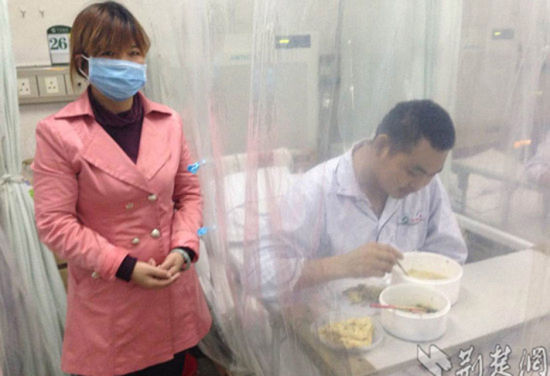 Her son eats lunch in a hospital