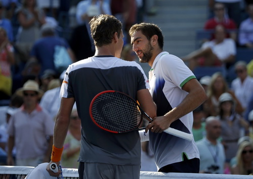 Cilic (phải) lần thứ nhì dự bán kết một giải Grand Slam