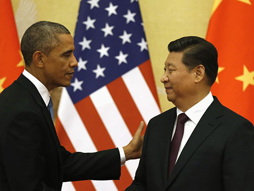 Tổng thống Mỹ Barack Obama (tr&aacute;i) v&agrave; Chủ tịch Tập Cận B&igrave;nh tại cuộc họp b&aacute;o ở Bắc Kinh hồi th&aacute;ng 11 Ảnh: Reuters