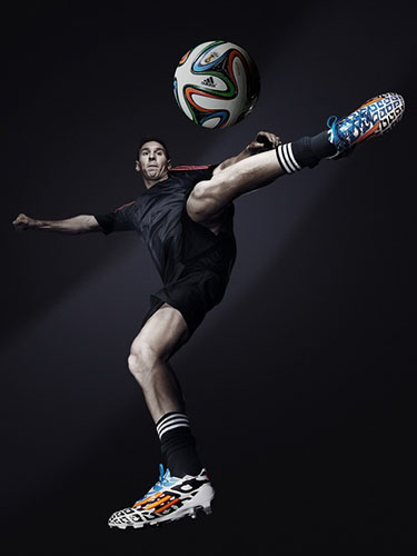Messi và giày mới tại VCK World Cup 2014 Ảnh: Adidas