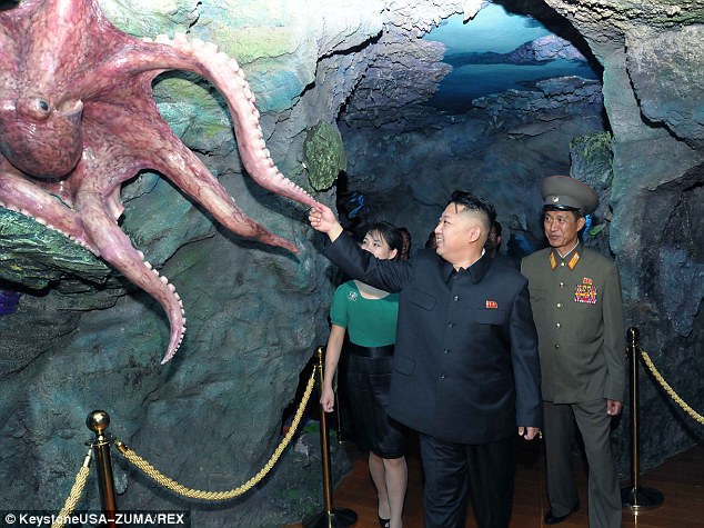 Definitely not real! The leader was seen excitedly stroking a model octopus tentacle during the outing