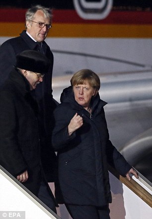 Angela Merkel, pictured as she arrived in Moscow today, believes a ceasefire remains the first step in achieving peace in Ukraine