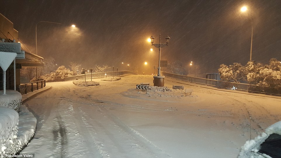 Major roads have been closed in Katoomba, pictured above, as snow and ice cover the asphalt