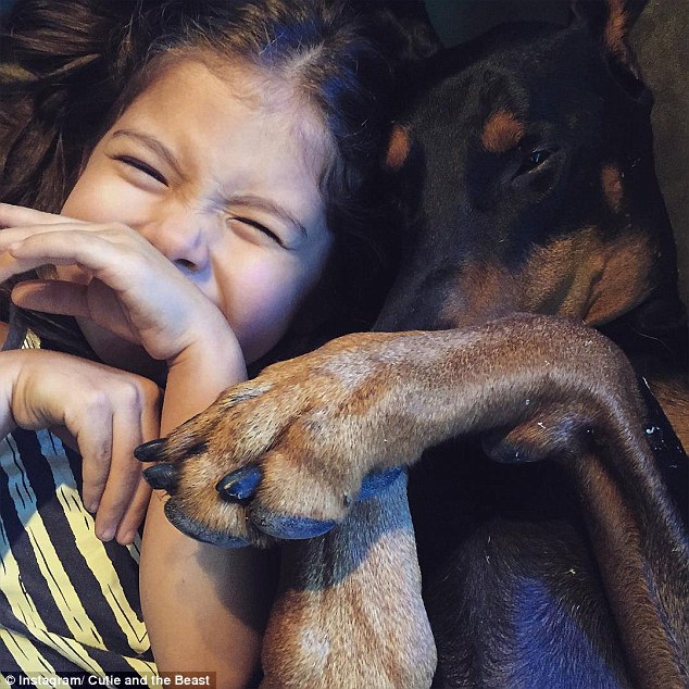 Playing around: Siena does her best impression of Buddha
