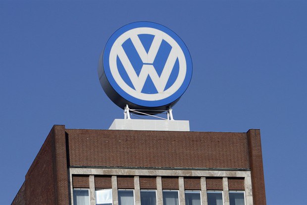 In this Feb. 24, 2011 file photo the Volkswagen logo is photographed at the companys headquarters at the Volkswagen plant in Wolfsburg, Germany.