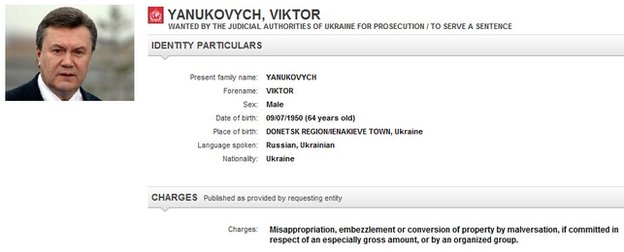Th&ocirc;ng b&aacute;o truy n&atilde; &ocirc;ng Yanukovych tr&ecirc;n website của Interpol. Ảnh: BBC