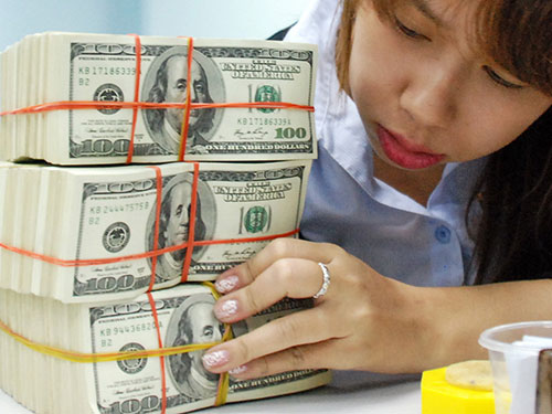 Khó đoán tỉ giá