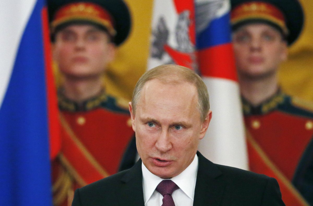 Tổng thống Nga Putin ph&aacute;t biểu tại lễ vinh danh c&aacute;c cựu binh thời Thế chiến thứ hai h&ocirc;m 20-2. Ảnh: Reuters