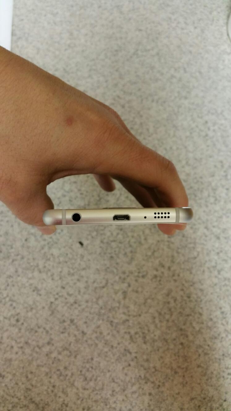 C&aacute;ch bố tr&iacute; cạnh dưới m&aacute;y c&oacute; n&eacute;t của iPhone 6.