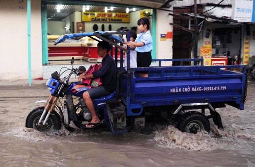 M&ugrave;a mưa năm nay, một số khu vực ở TP HCM sẽ tho&aacute;t cảnh ngập nước Ảnh: Ho&agrave;ng Triều