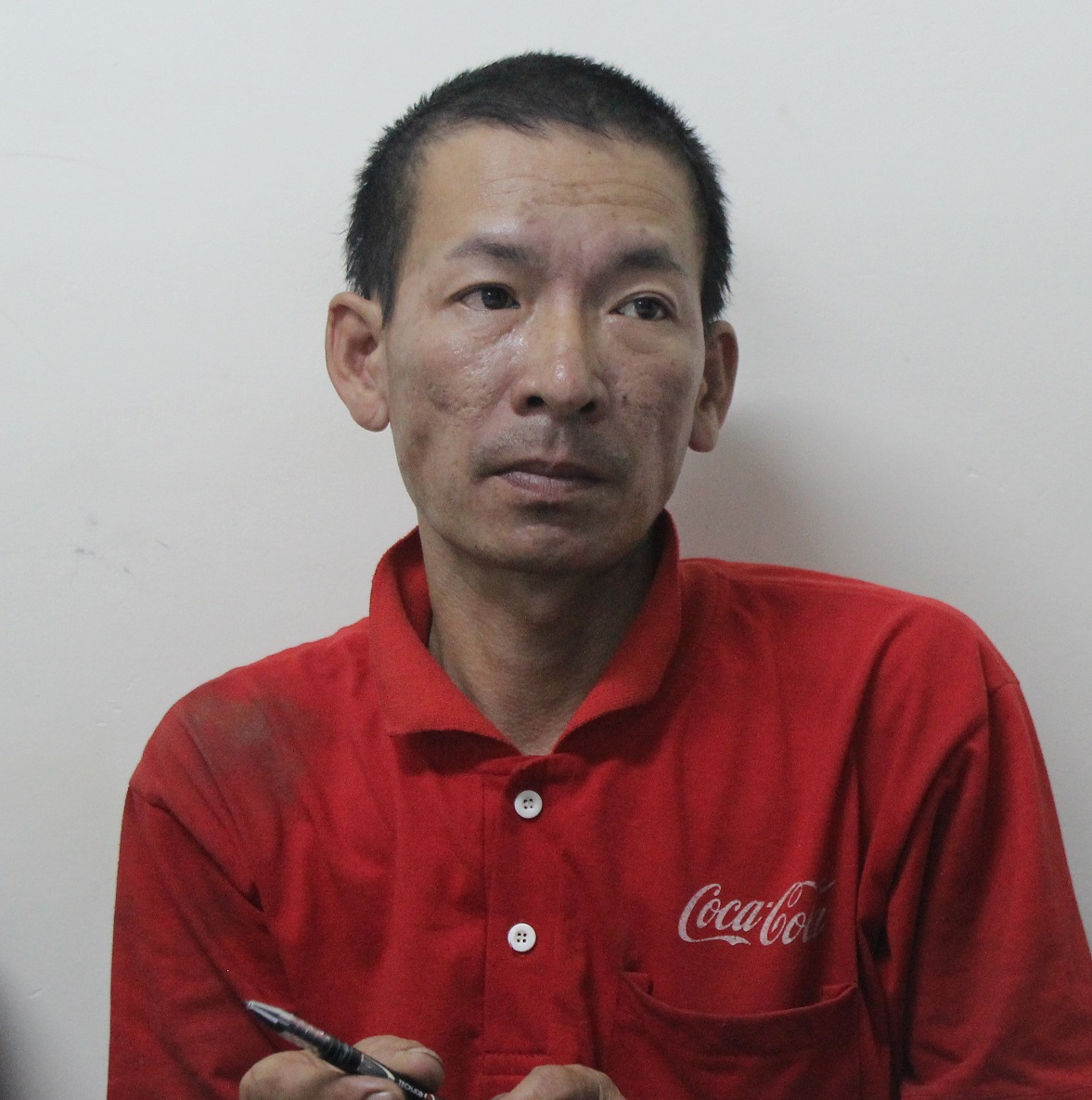 Đối tượng Vinh tại cơ quan công an. Ảnh: N. Tú