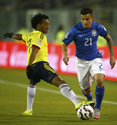 Coutinho (phải), một trong những niềm hy vọng của Brazil ở trận gặp Venezuela rạng sáng 22-6 Ảnh: REUTERS